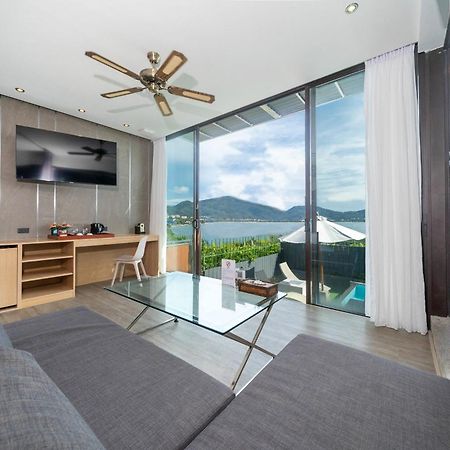 Indochine Resort And Villas - Sha Extra Plus Patong Exterior foto A living room at the hotel