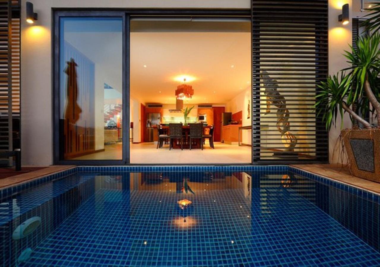Indochine Resort And Villas - Sha Extra Plus Patong Exterior foto A pool at the hotel