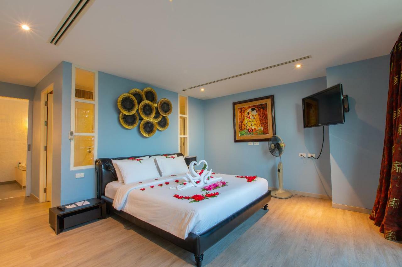 Indochine Resort And Villas - Sha Extra Plus Patong Exterior foto A bedroom at the hotel